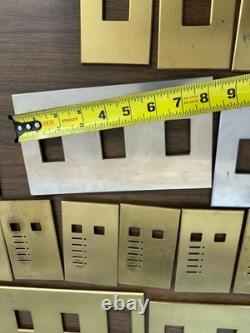 Lot (1) Plaques murales Lutron couleur or/bronze argentée variateur